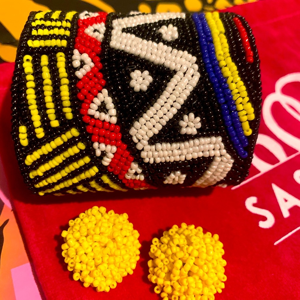 Sj Sherri cuff and yellow earrings